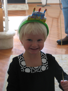 Posing with her hat