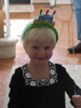 Posing with her hat