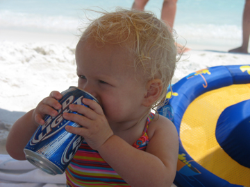 Enjoying a cold beer (she wishes)