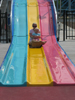 On the slide with Mommy