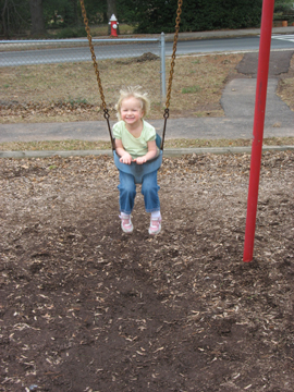 Kaitlyn on a swing