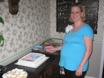 Amy cutting the cake