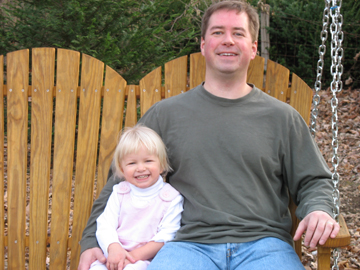 Kaitlyn and Daddy swinging