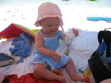 Playing with her lunch