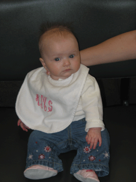 Waiting in the airport for her first plane ride