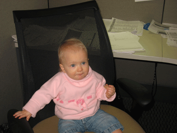 Sitting at Daddy's desk