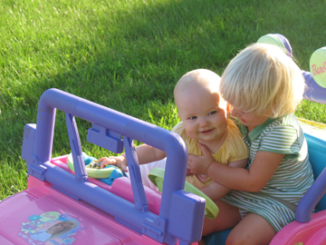 Hugging in their new jeep