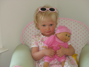 Sitting with her baby
