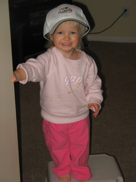 Kaitlyn hamming it up on a stepstool